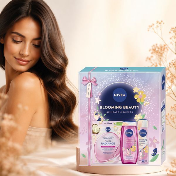 Set pentru cadou Nivea Blooming Beauty: gel de dus 250 ml, deodorant spray 150 ml si masca servetel iluminatoare